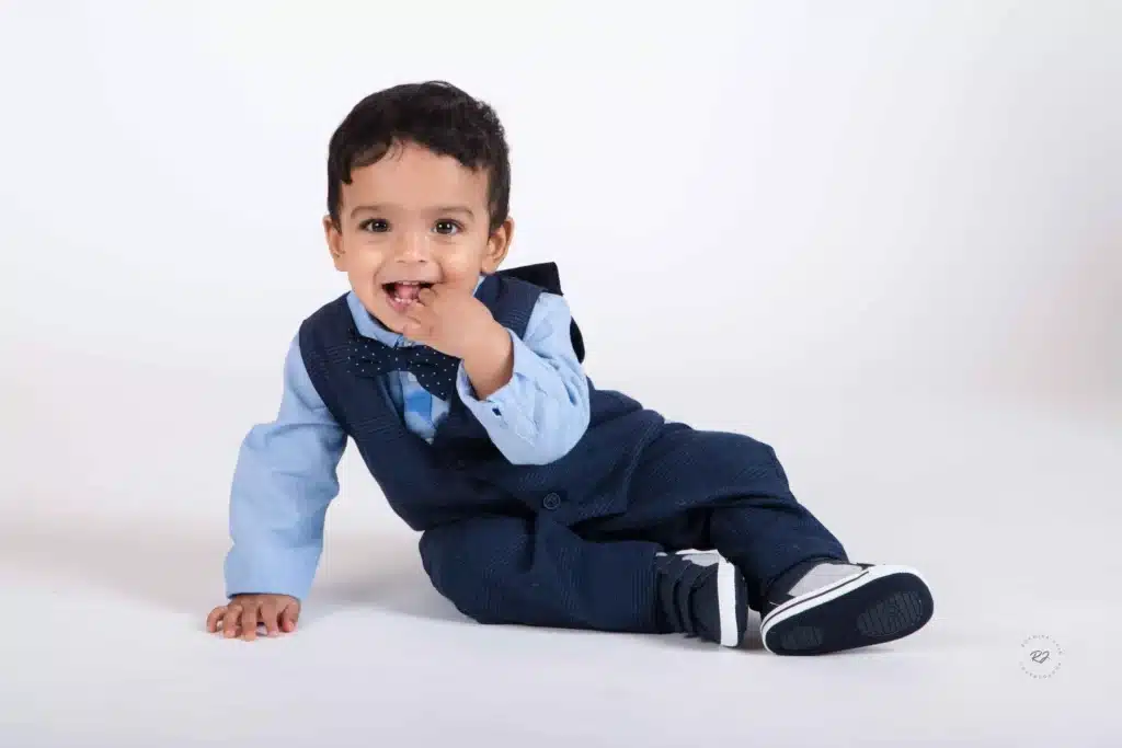 Close-up portrait of a child with a big smile, taken in Wellington